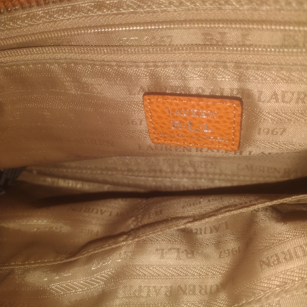 *designer bright orange handbag*